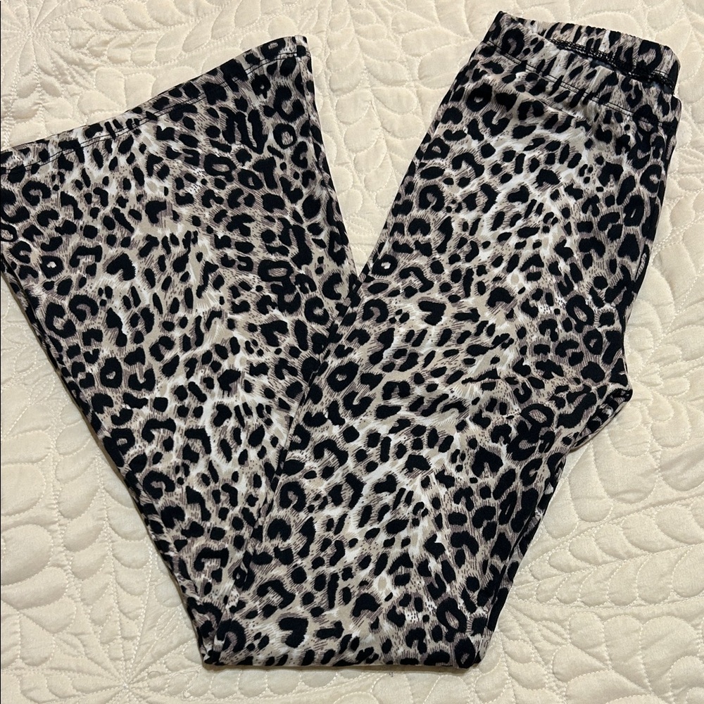 Brand new!! Stylish bell bottom Leopard Print leggings.